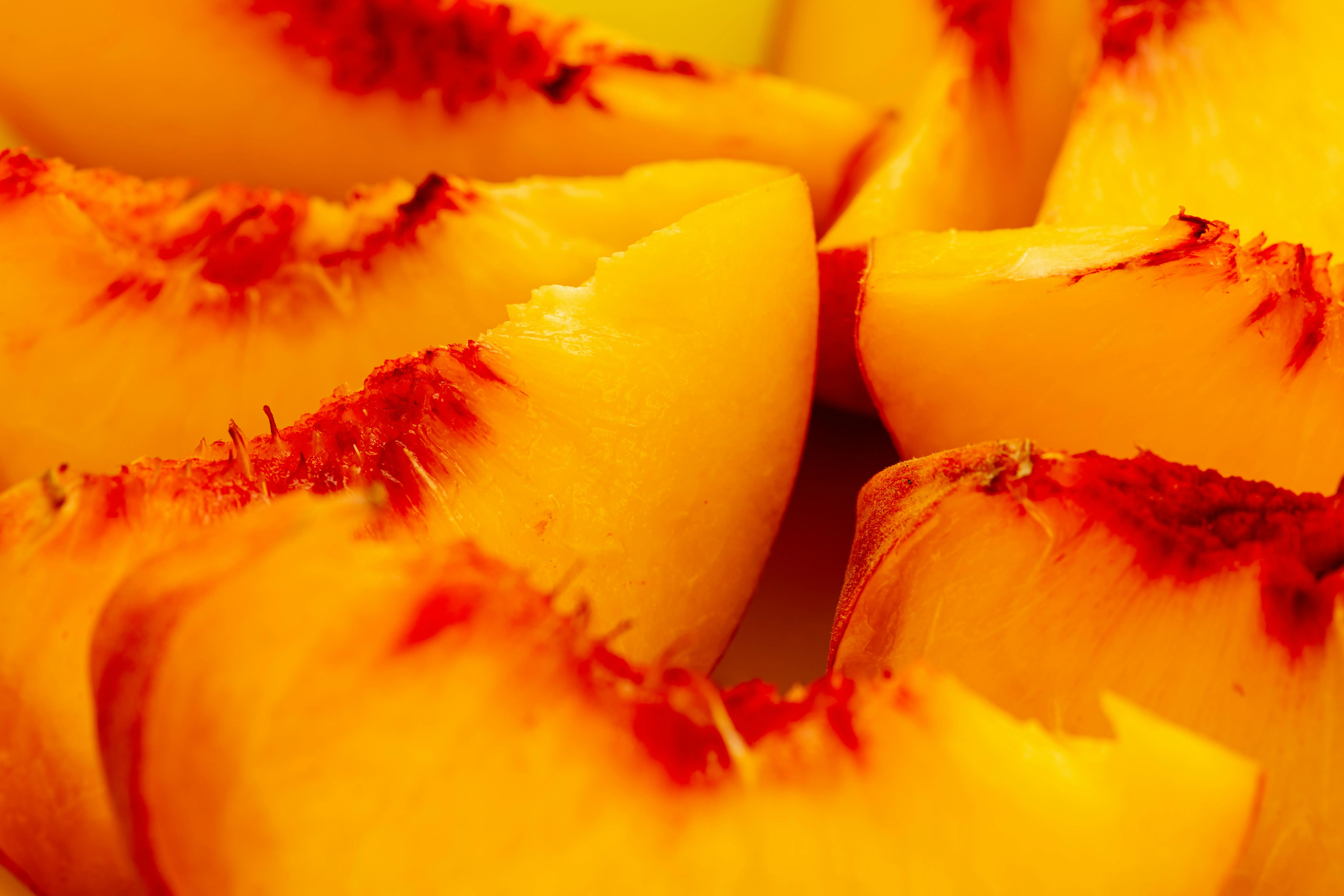 Fresh golden peach slices for smoothie recipe, juicy peach fruit showing vitamins and nutrients